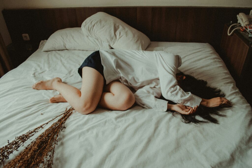 Woman napping as a perimenopause and menopause lifestyle habit.
