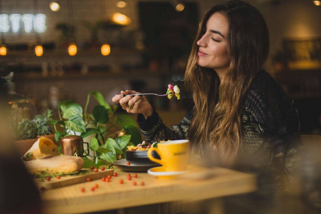 Woman practicing mindful eating.